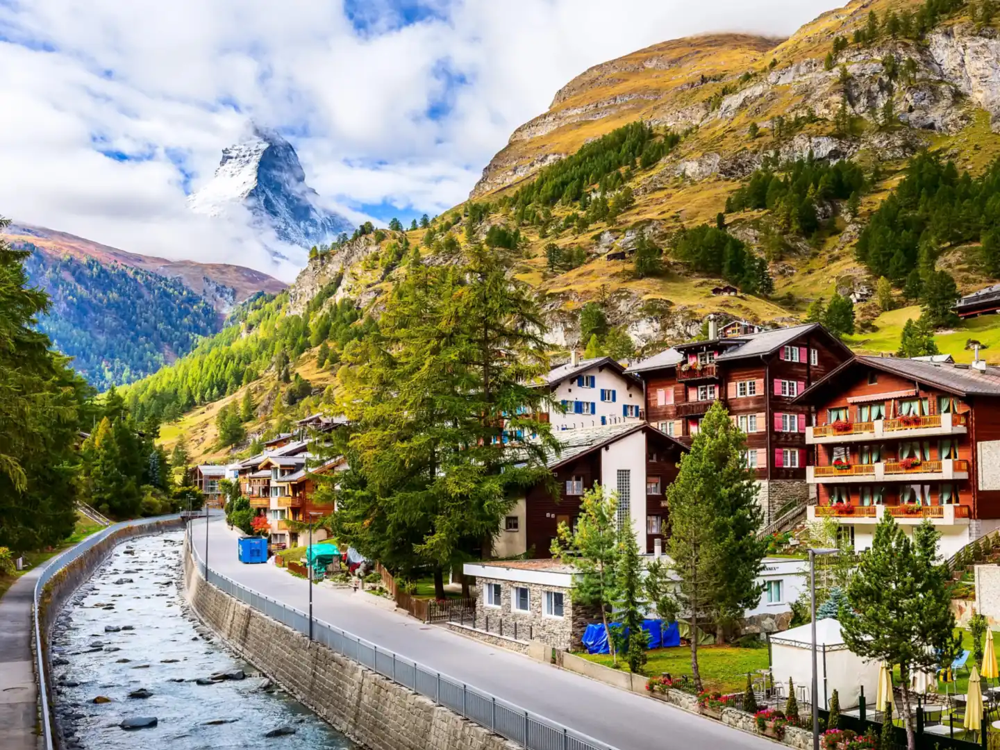 The Matterhorn above a larch-lined lake near Zermatt